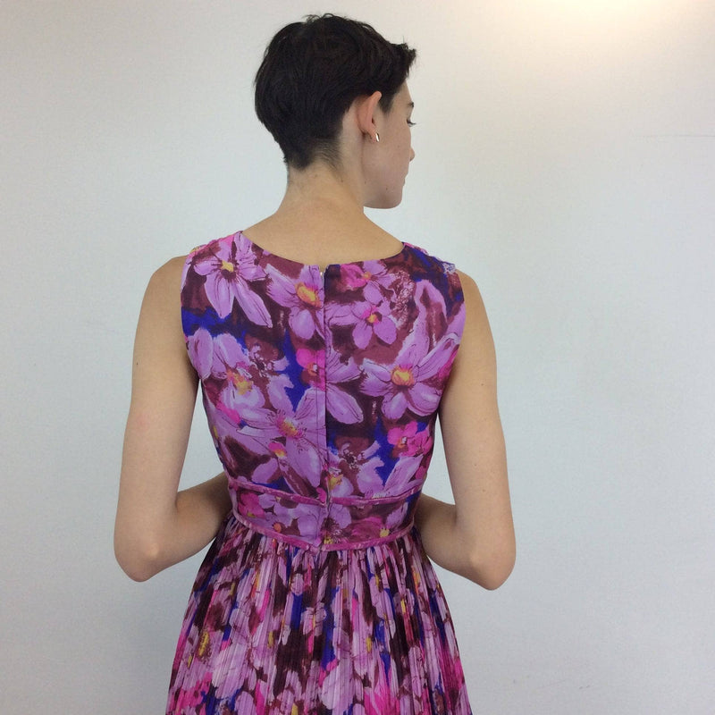 Back view of 1970s Sleeveless Floral Print Maxi Dress Small sold by bohemevintage.com