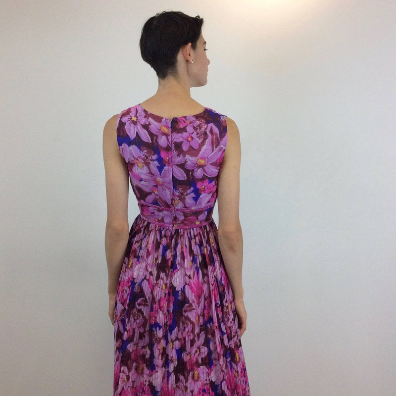 Back view of 1970s Sleeveless Floral Print Maxi Dress Small sold by bohemevintage.com