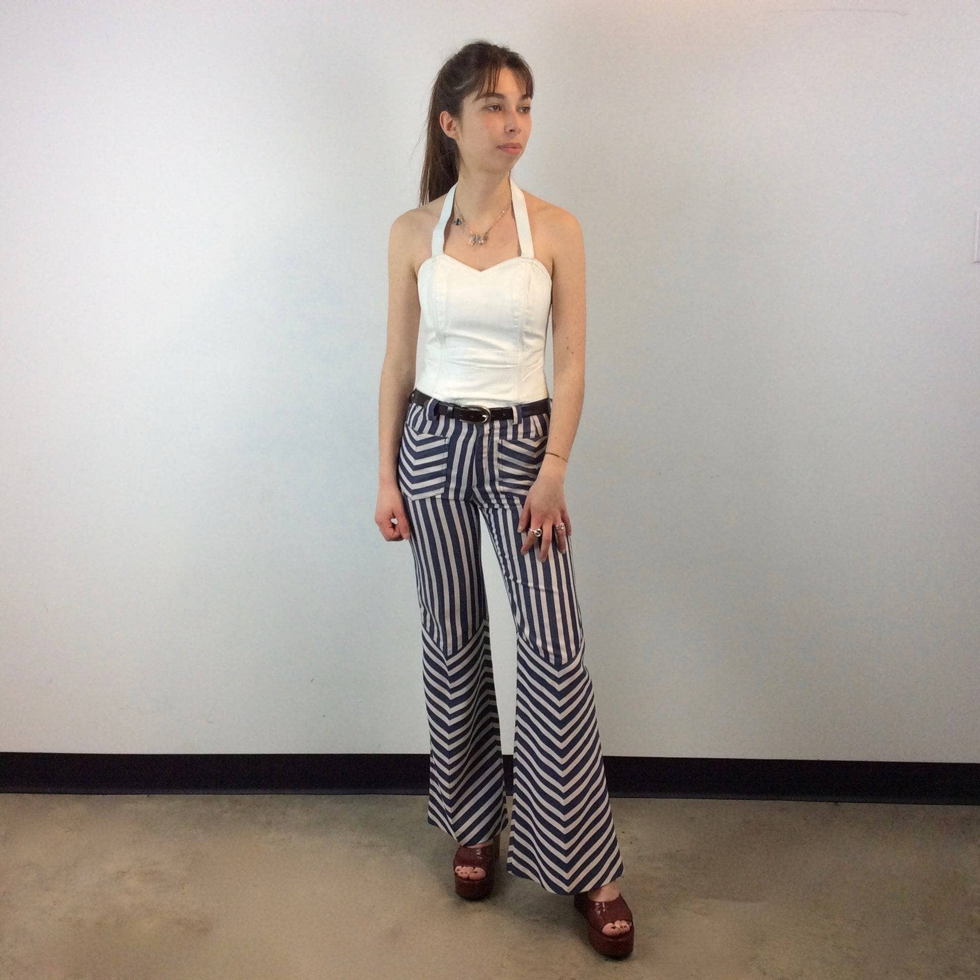1970s Striped Bell Bottom Jeans Size X-Small / Small sold by bohemevintage.com Montreal