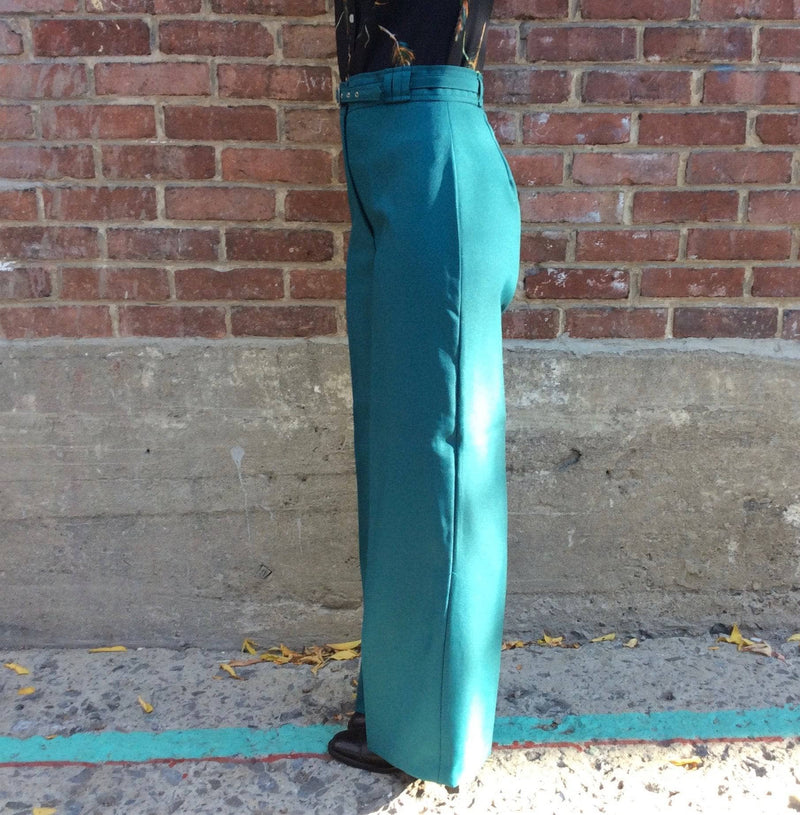 Side view of 1970s Teal High Waisted Wide Leg Pants size Medium sold by bohemevintage.com Montreal