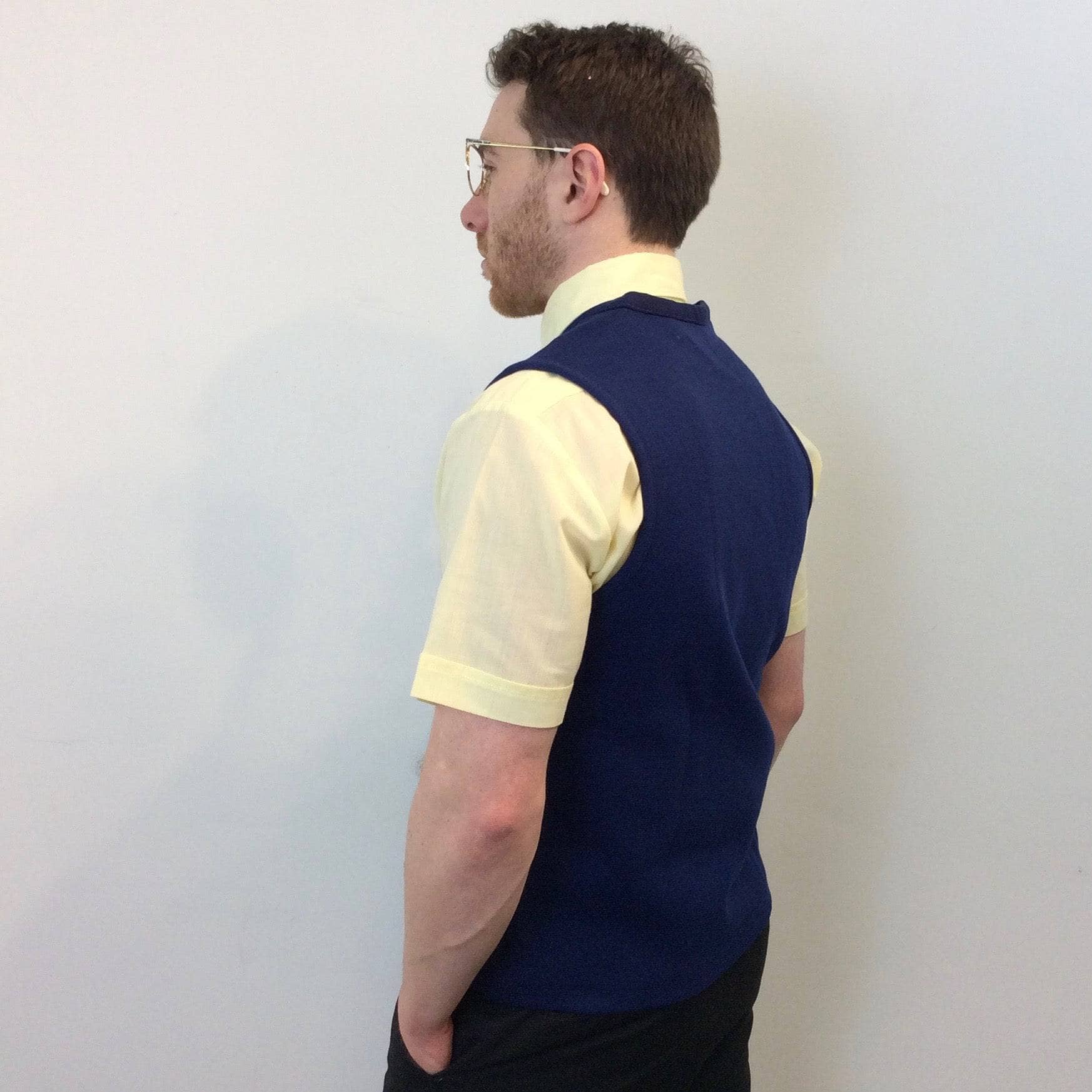 Back view of 1970s "Tundra" Men's Suede and Wool Knit Vest Size Small, sold by bohemevintage.com Montréal