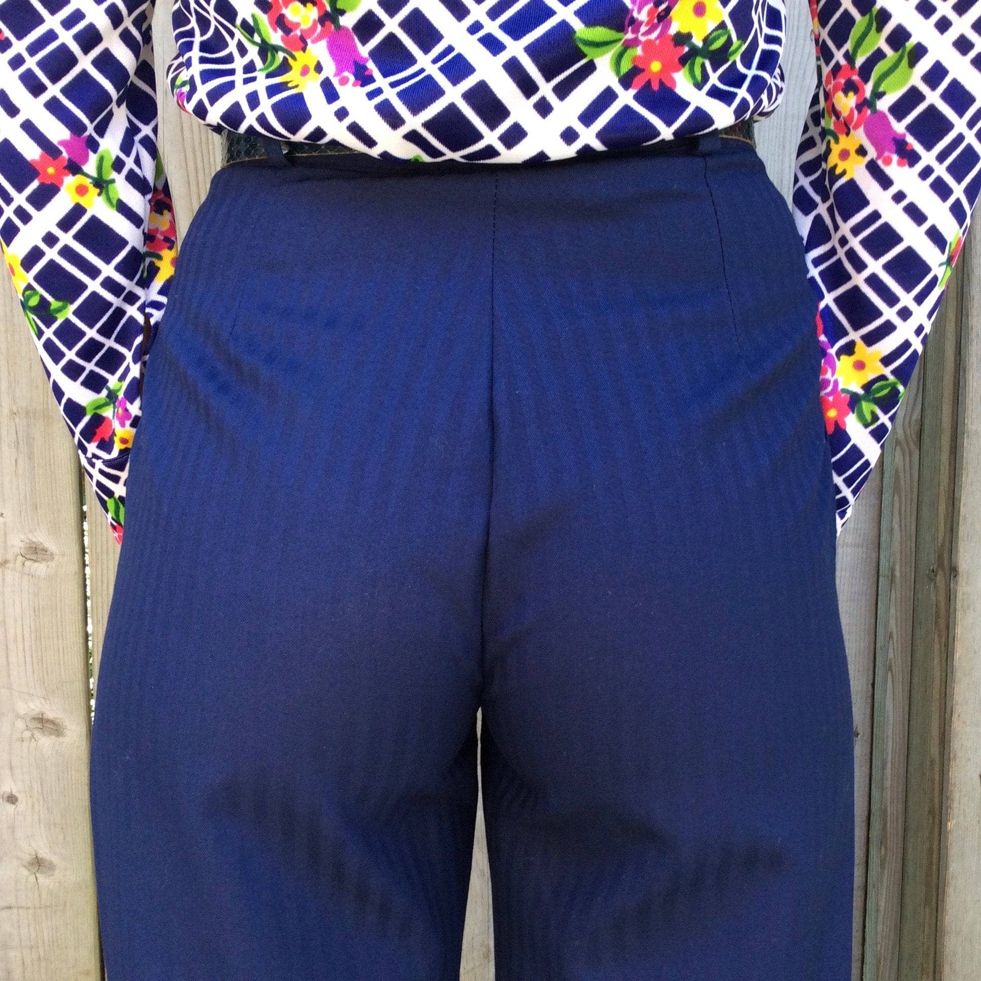 1980-90s  navy blue high waisted pleated pants sold by Bohème Vintage 