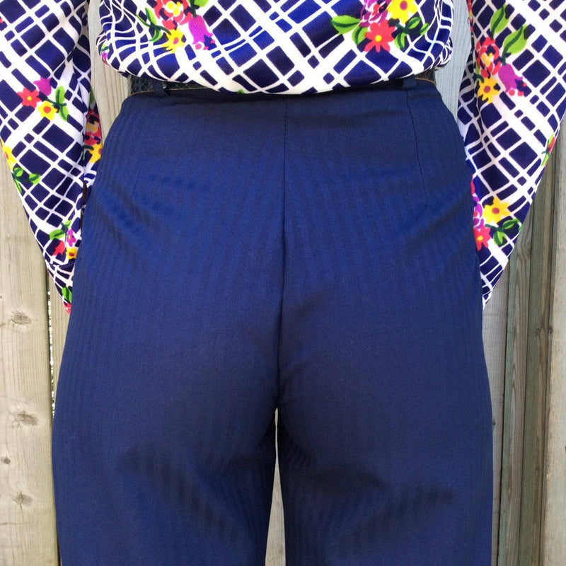 1980-90s  navy blue high waisted pleated pants sold by Bohème Vintage 