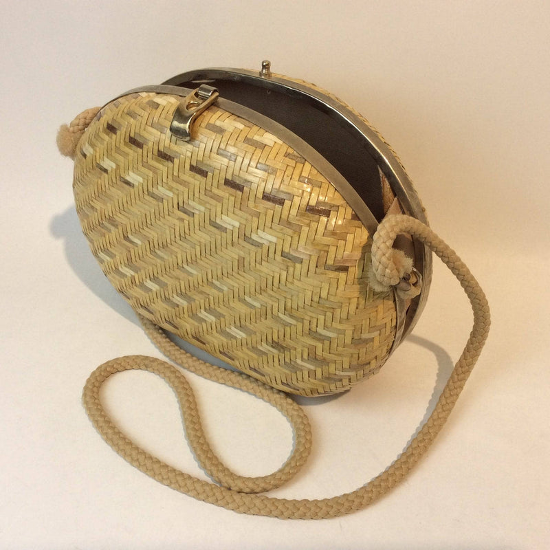 Open view of 1980s-1990s Oval Shape Hard Shell Woven Straw Shoulder Bag sold by bohemevintage.com Montreal