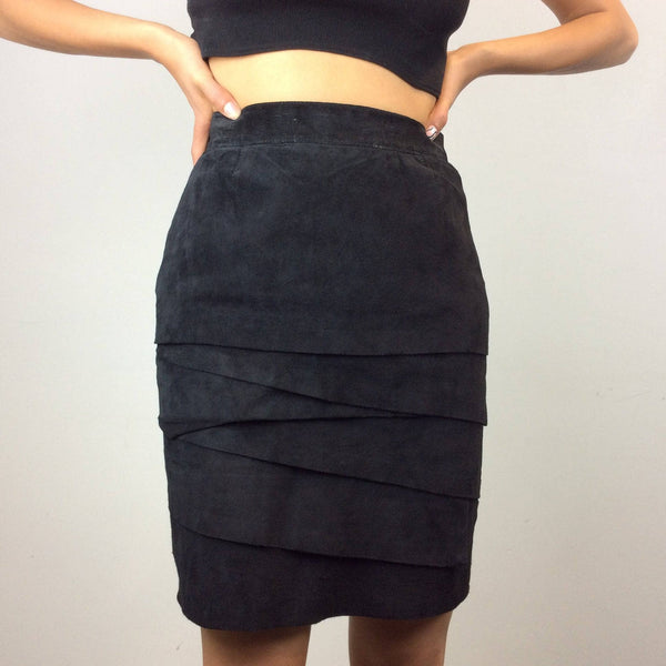 Close-up view of 1980s-90s High Waist Black Layered Suede Skirt Size Small sold by bohemevintage.com Montreal