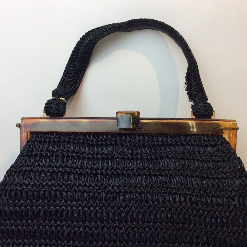 Clasp &Handle view of 1980s Black Raffia Crocheted Handbag, sold by bohemevintage.com Montréal