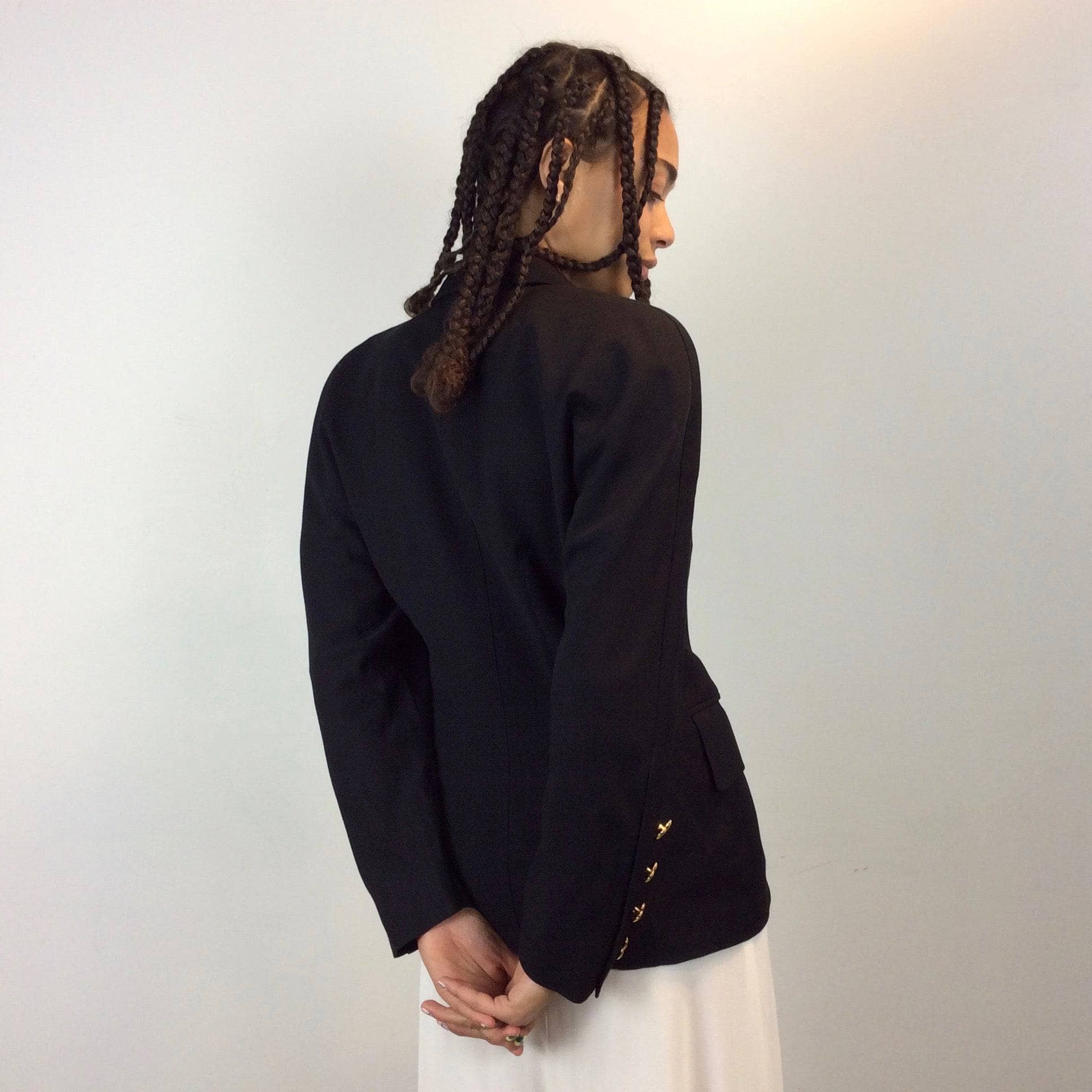 Back view of 1980s Escada Black Wool Blazer Size Medium sold by bohemevintage.com
