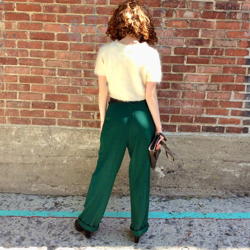 Back view of 1980s Guy Laroche High-waisted pleated wool trousers Size 8-10 sold by bohemevintage.com Montreal