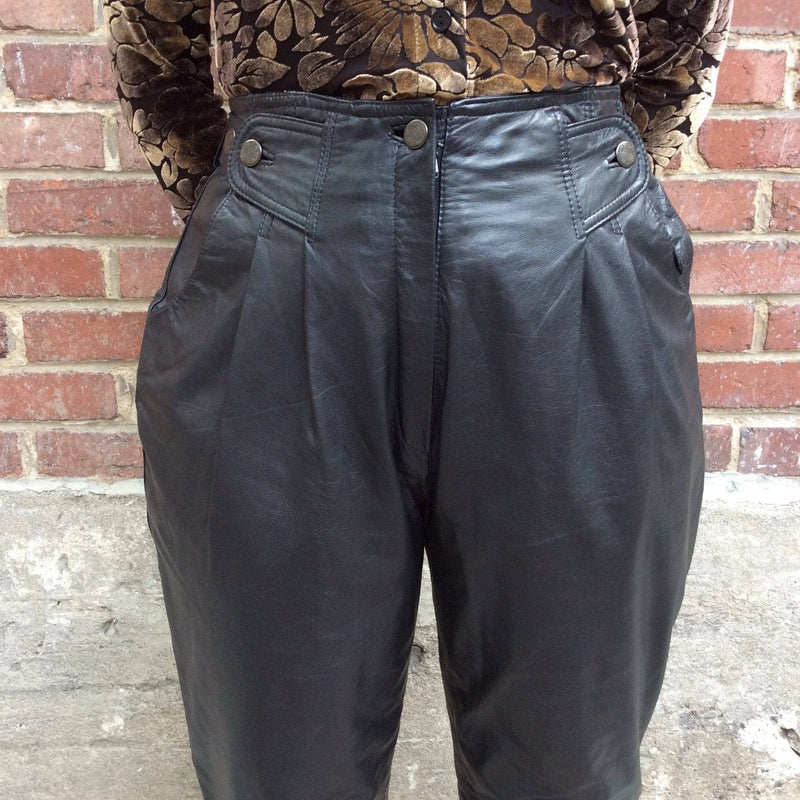 Hips & Waist Close-Up of 1980s High Waisted Black Genuine Leather Pants, sold by bohemevintage.com Montreal