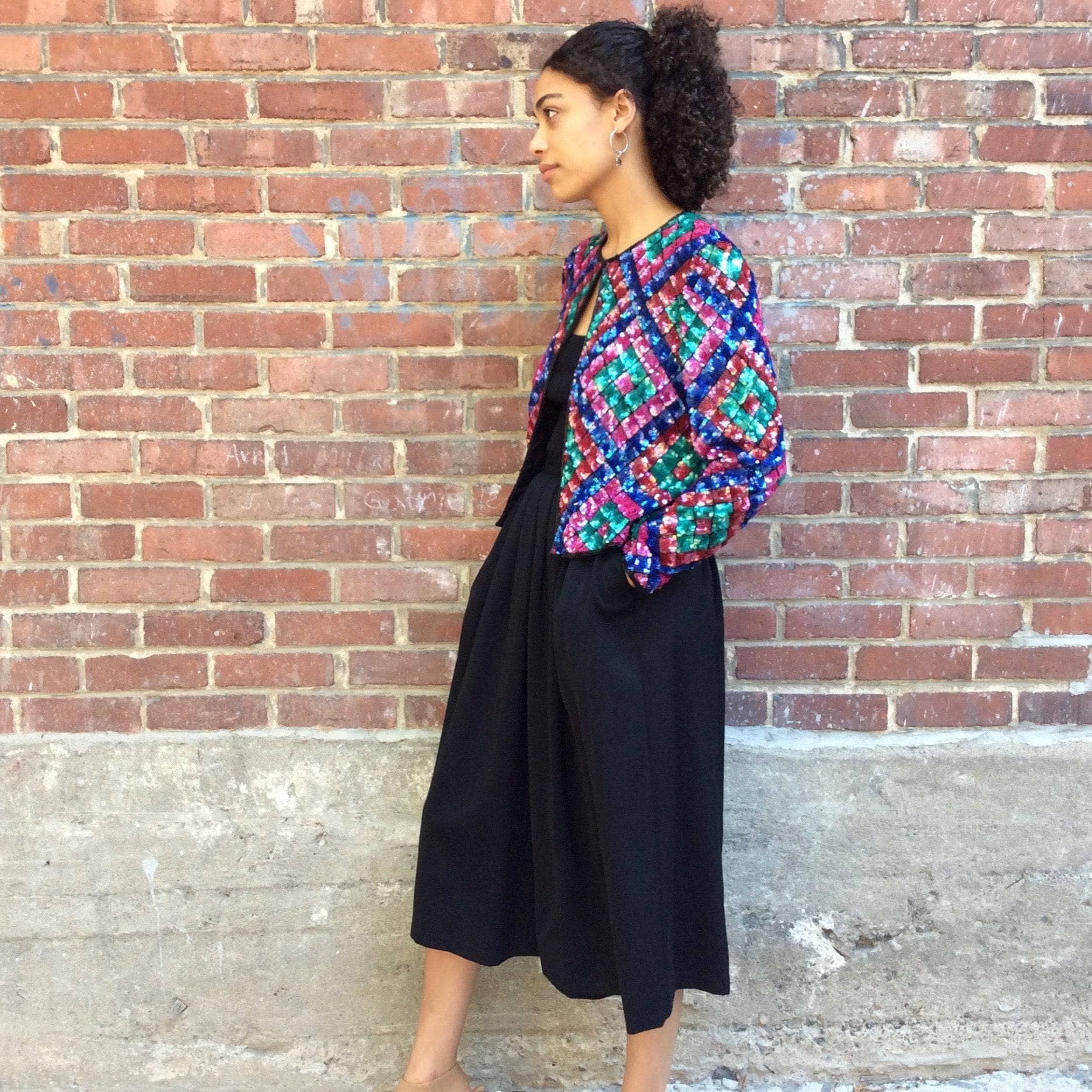 SIde view of 1980s Nipon Night Multi-Coloured Sequin and Bead Short Jacket, for sale at bohemevintage.com Montréal