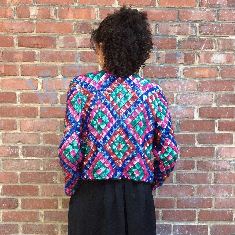 Back view of 1980s Nipon Night Multi-Coloured Sequin and Bead Short Jacket, for sale at bohemevintage.com Montréal