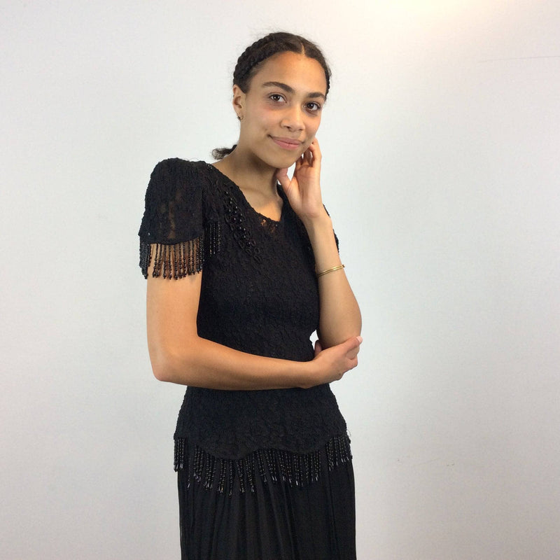 1980s Black Short sleeve lace with beaded fringes Midi Dress Size Medium sold by bohemevintage.com Montreal