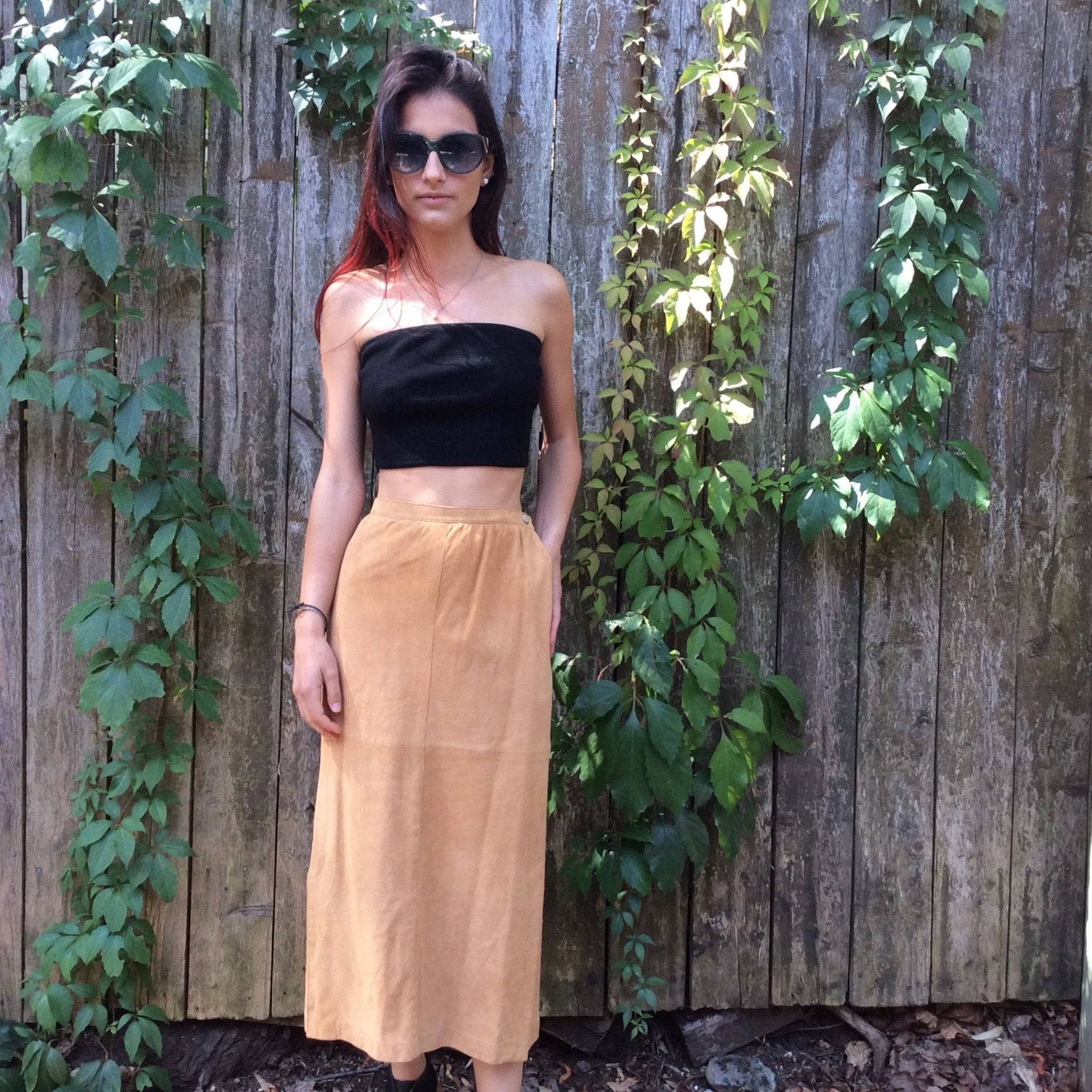 Front view of 1980s Straight Cut Midi length Caramel Suede Skirt solld at bohemevintage com Montreal