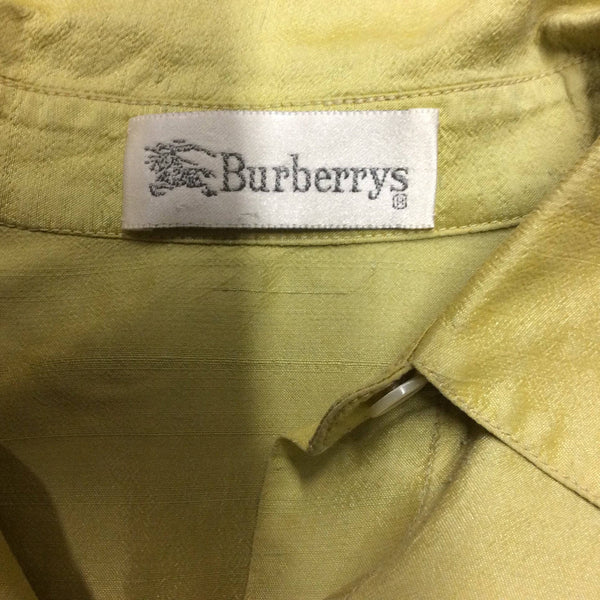 Label of 1990s Burberrys Raw Silk button-up shirt Size Medium sold by bohemevintage.com Montreal