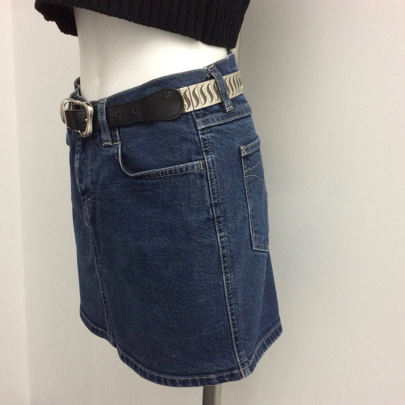 Side View of 1990s Calvin Klein Medium Rise Denim Mini Skirt, Size Small, sold by bohemevintage.com Montreal