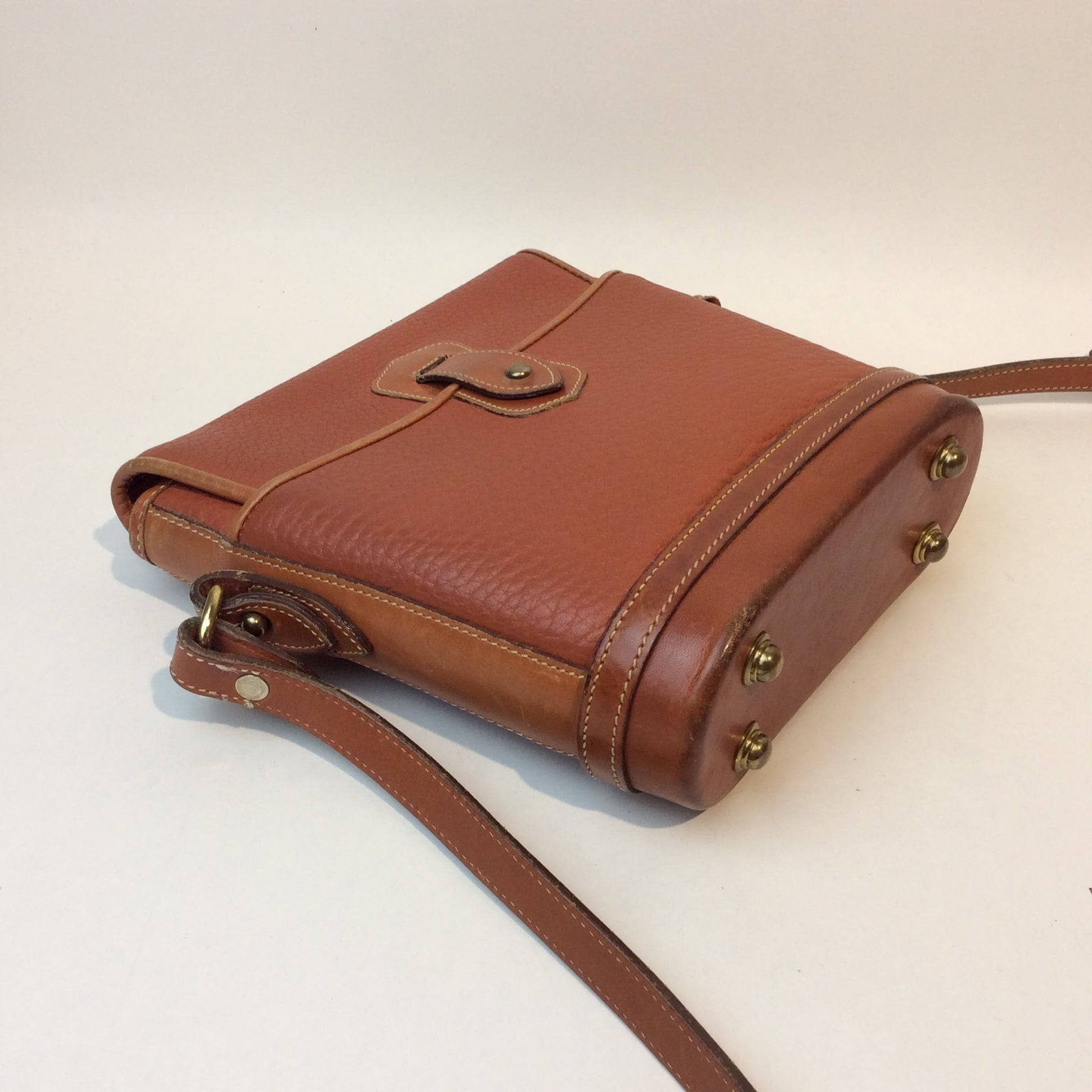1990s Dooney & Bourke Tan Leather Crossbody Bag. Sold by bohemevintage.com