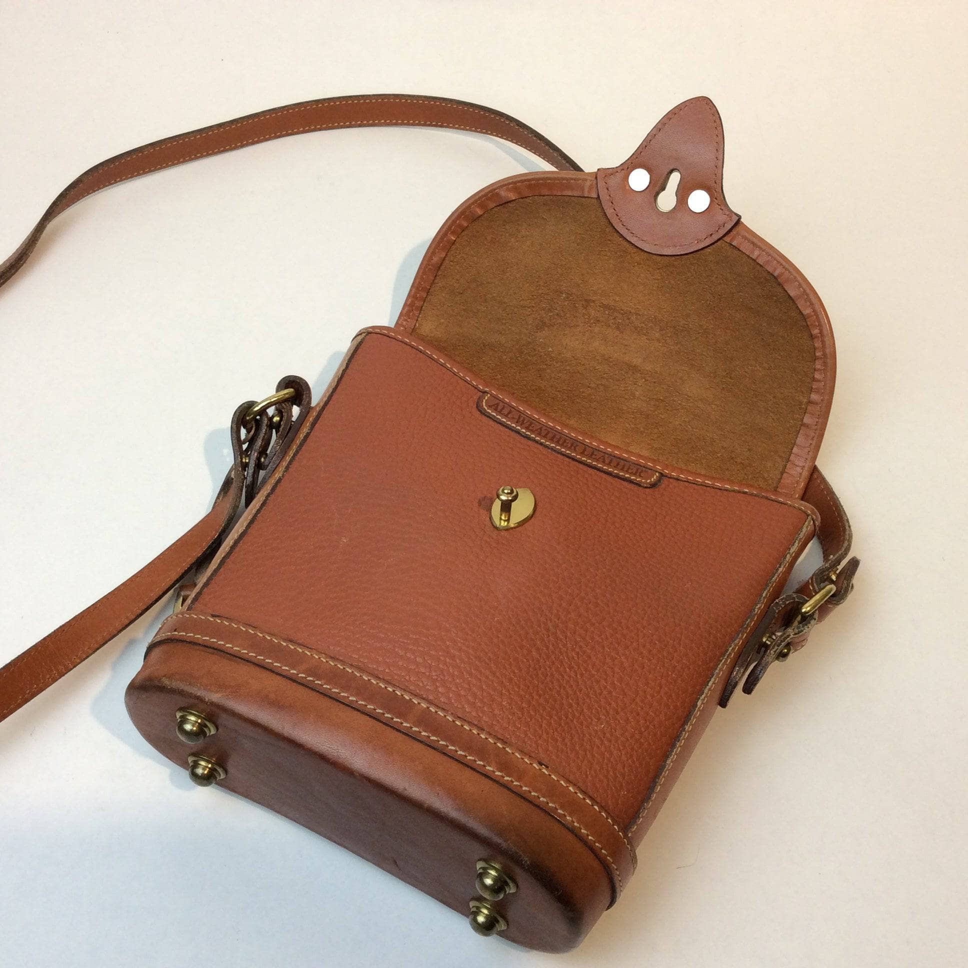 1990s Dooney & Bourke Tan Leather Crossbody Bag. Sold by bohemevintage.com