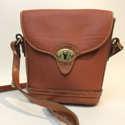 1990s Dooney & Bourke Tan Leather Crossbody Bag. Sold by bohemevintage.com