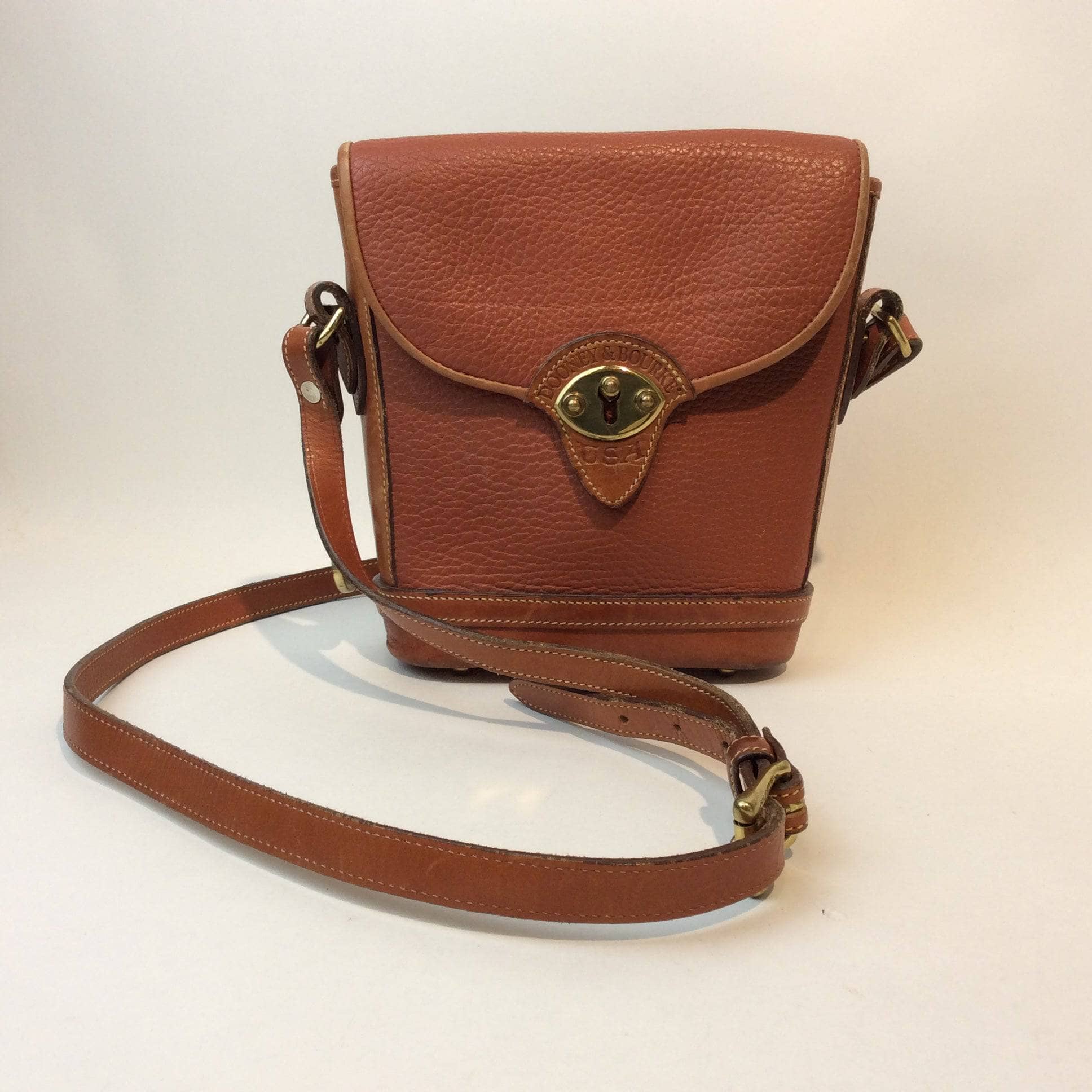 1990s Dooney & Bourke Tan Leather Crossbody Bag. Sold by bohemevintage.com