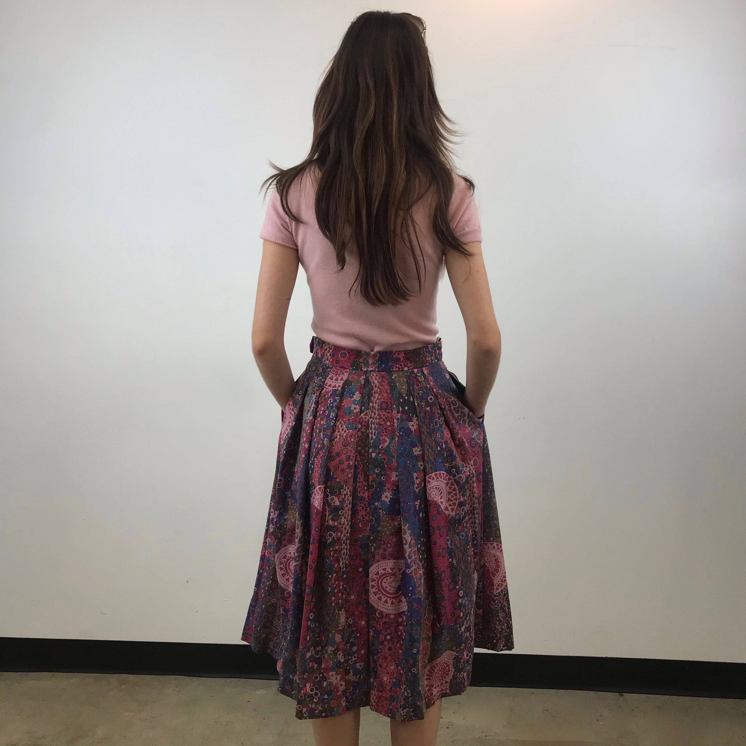 Back view of 1990s Geiger Midi Length Foulard Print Pleated Midi Skirt Size small, sold by Bohemevintage.com