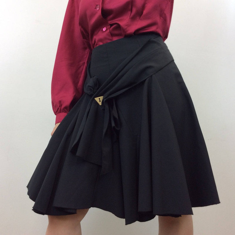 1936 × 1936px  Close up of 1990s George Lévesque Tiered Knee Length Black Skirt size Medium sold by bohemevintage.com