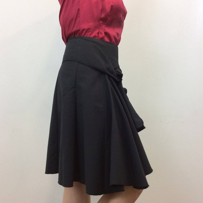 Side view of 1990s George Lévesque Tiered Knee Length Black Skirt size Medium sold by bohemevintage.com