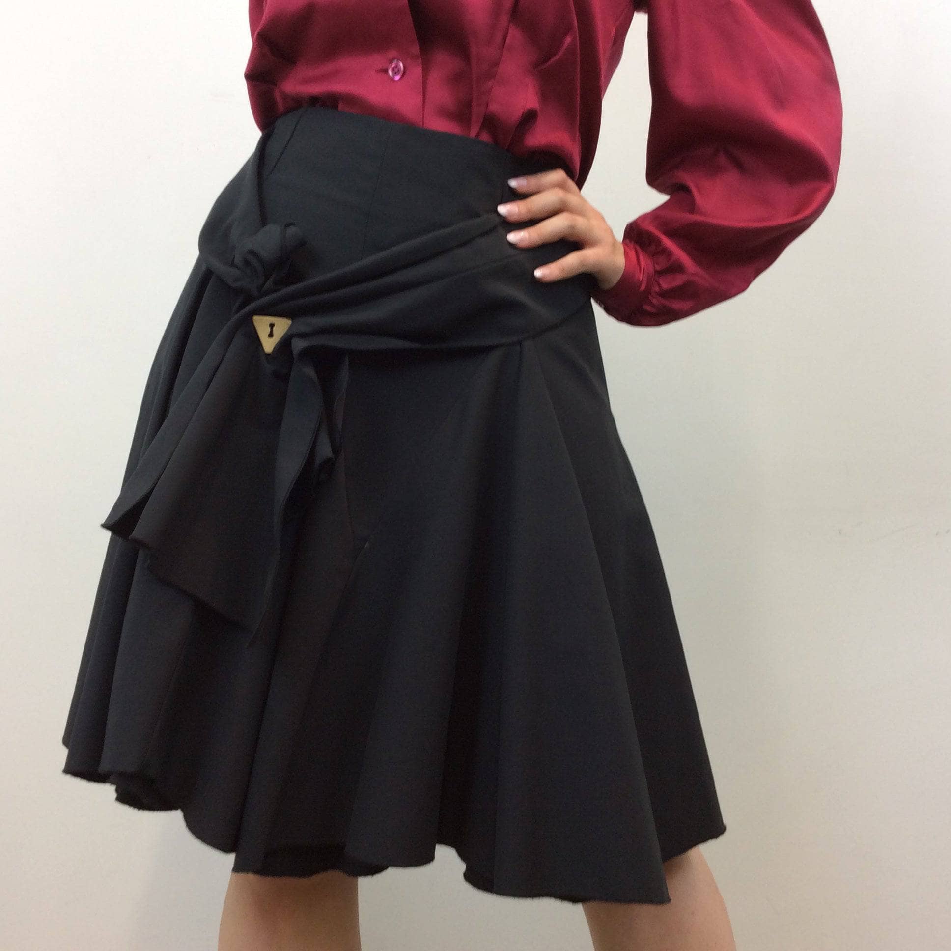 Close up of 1990s George Lévesque Tiered Knee Length Black Skirt size Medium sold by bohemevintage.com