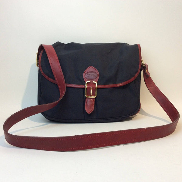 1990s | Designer Medium Navy Messenger Shoulder Bag | Longchamp PARIS. Sold by bohemevintage.com
