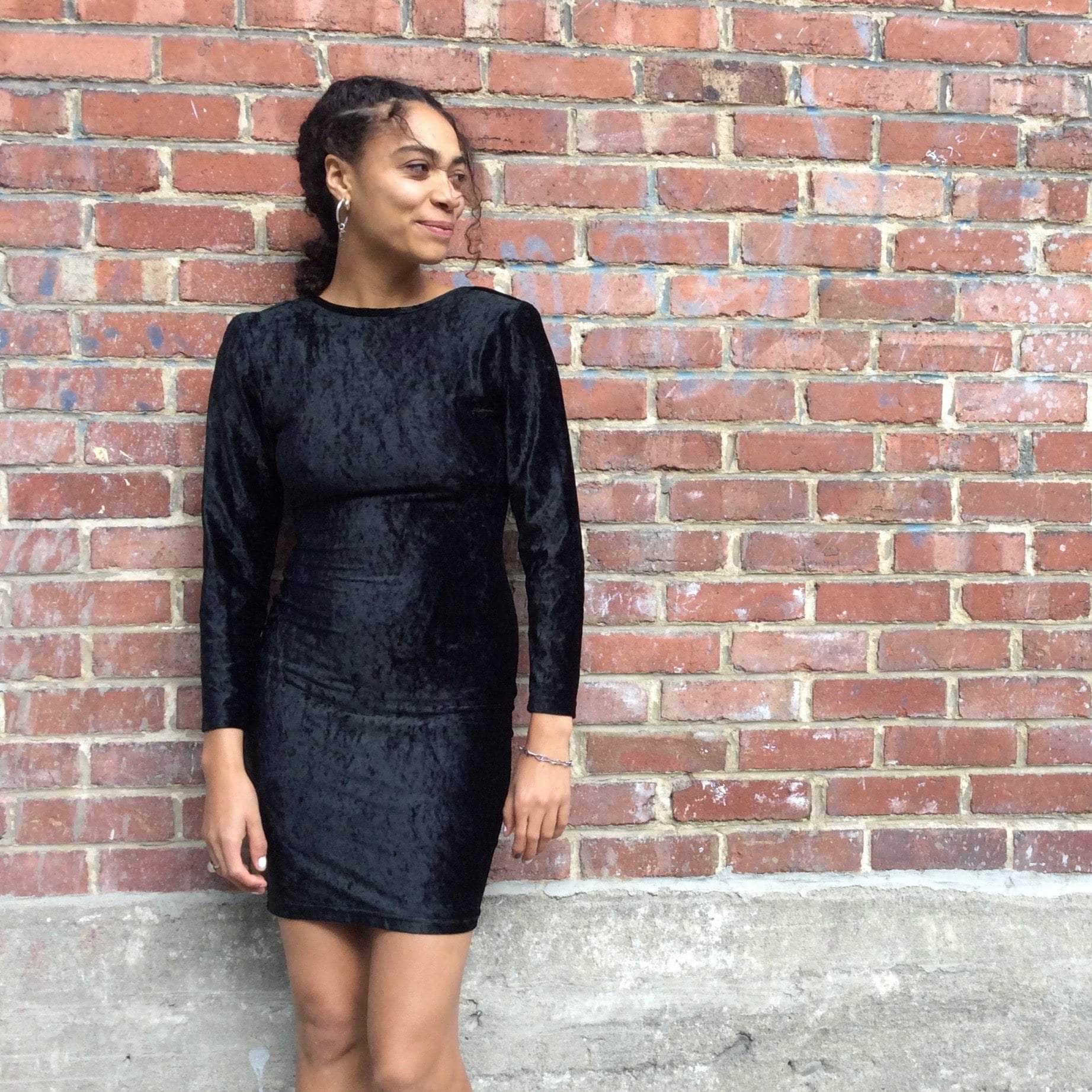 Front View of 1990s Open Back Black Velvet Bodycon Mini Dress Size Small sold at bohemevintage.com Montreal