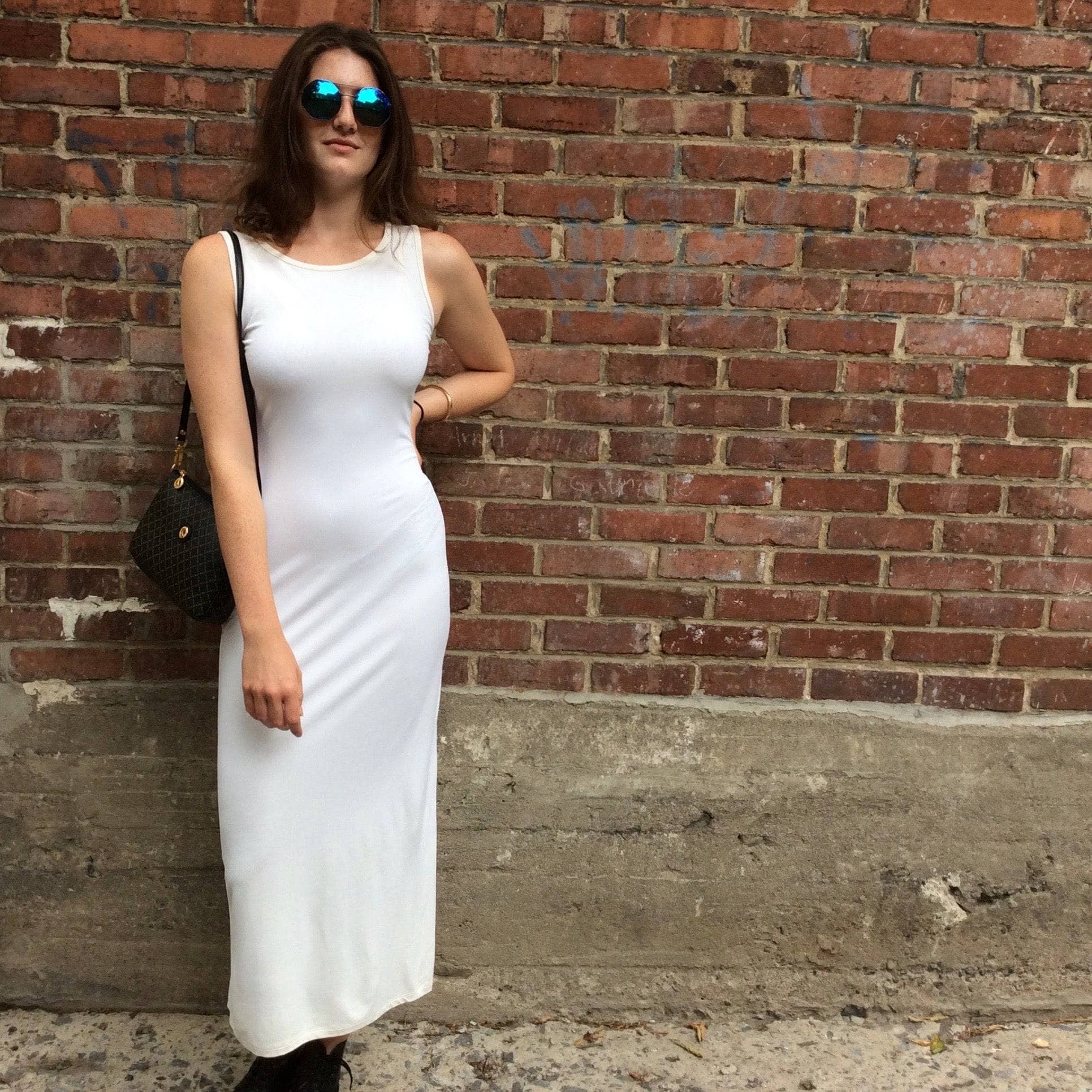 1990s Sleeveless Fitted White Maxi Dress Size Small, sold by bohemevintage.com Montreal