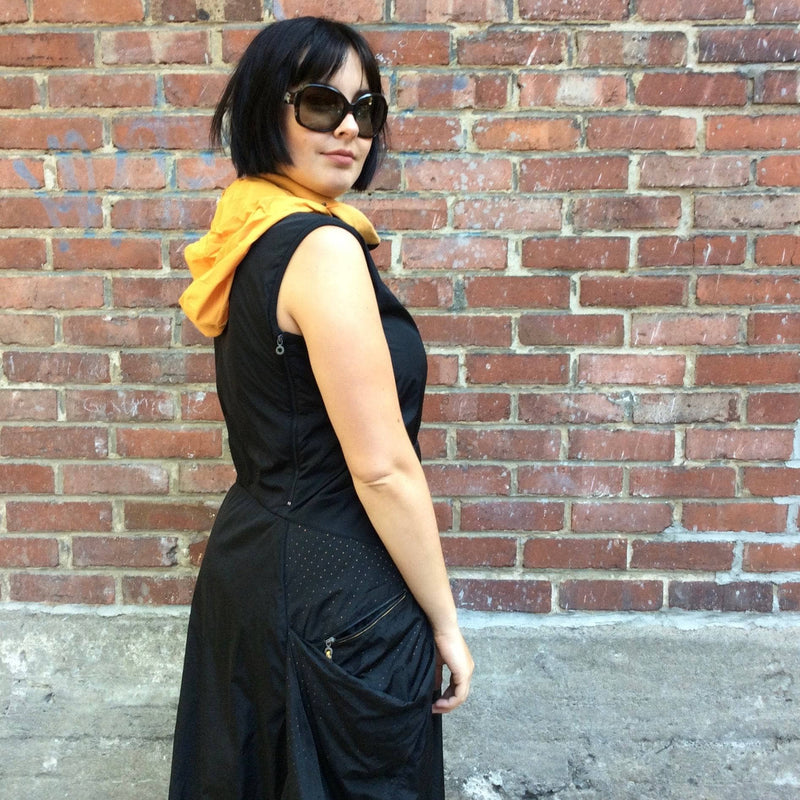 Side View of 2000s "Marithé François Girbaud" Mid-Length Quilted Black Dress size Medium, sold by bohemevintage.com Montreal