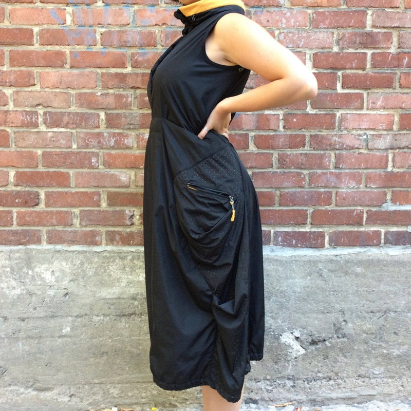 SIde View of 2000s "Marithé François Girbaud" Mid-Length Quilted Black Dress size Medium, sold by bohemevintage.com Montreal