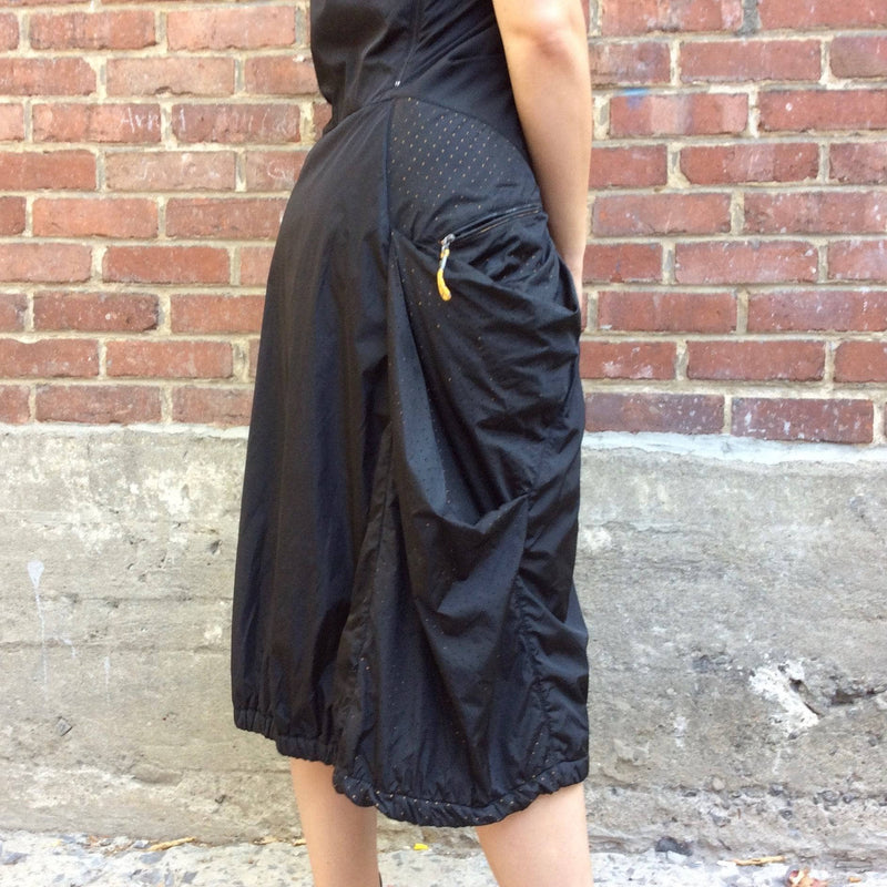 Lower Side View of 2000s "Marithé François Girbaud" Mid-Length Quilted Black Dress size Medium, sold by bohemevintage.com Montreal