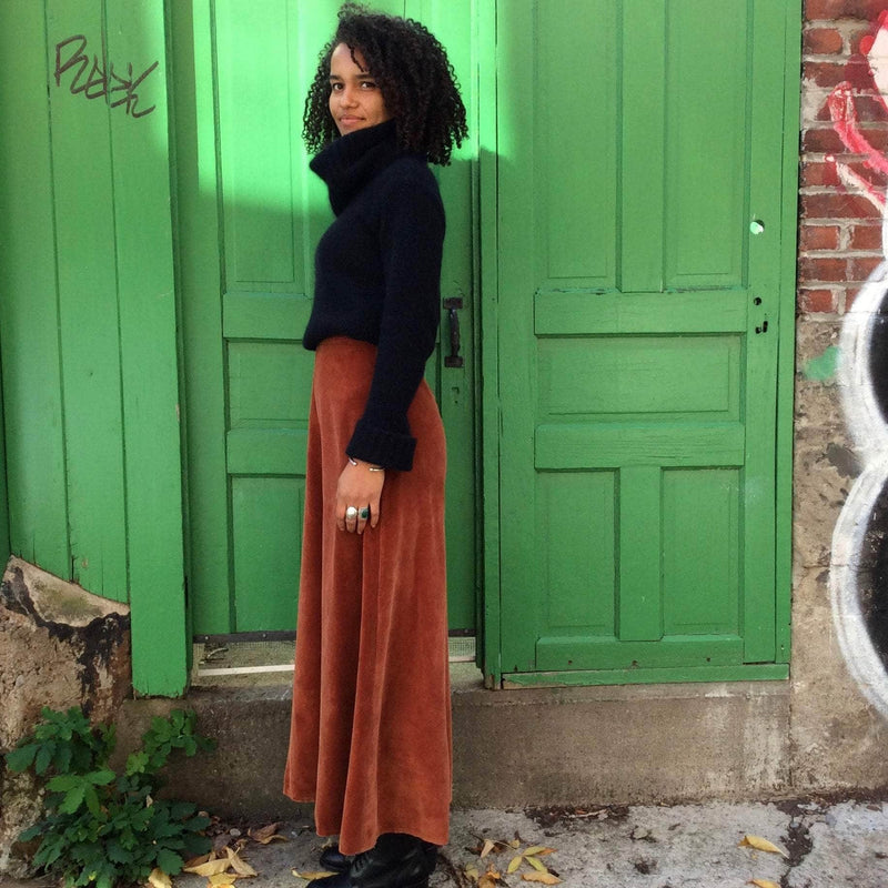 Side view of 1970s Brick Colour Maxi Velvet Skirt Small sold at bohemevintage.com Montreal