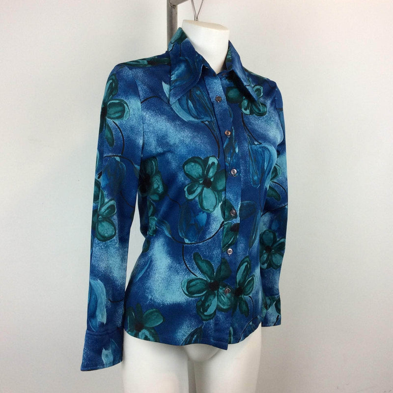 Side view of 1970s Bold Floral Print Blouse Size Small/Medium Sold by Bohème Vintage Montreal