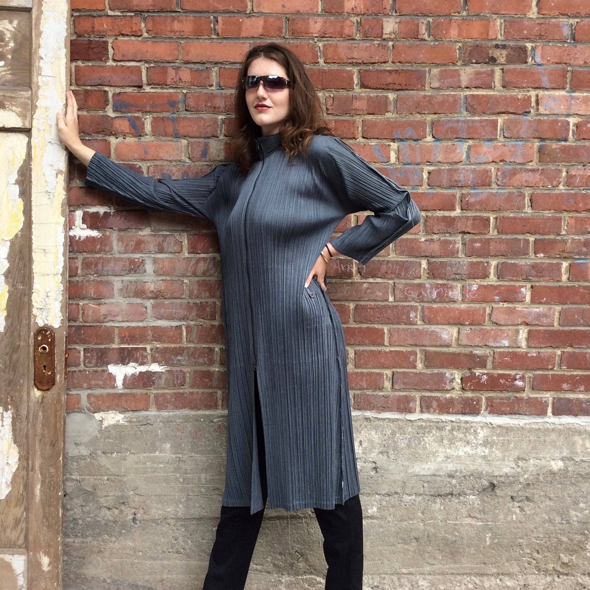 Side View of Zipped up Issey Miyake Long Asymmetrical Light-Weight charcoal grey Crinkle Coat, sold by bohemevintage.com Montréal