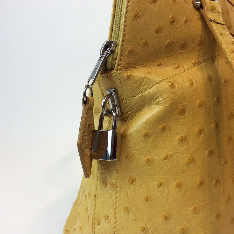 Ostrich Print Yellow Leather Carryall | Maxima (zipper & lock detail)