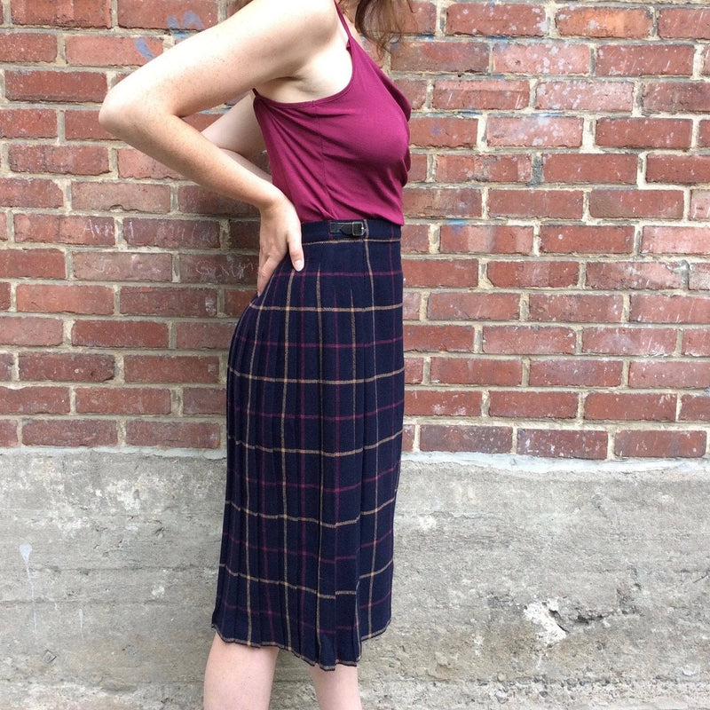 Side view of Midi-Length Pleated Tartan Wool Skirt Size S-M sold by bohemevintage.com
