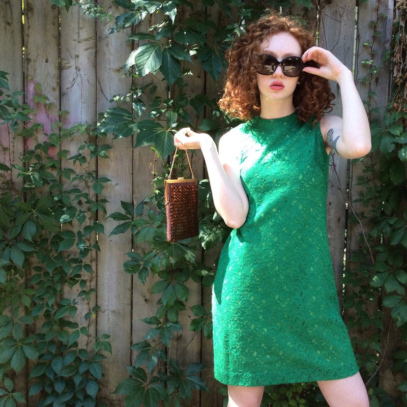 Front view of 1960s Green Lace Mini Shift Dress size Small sold on bohemevintage.com Montreal