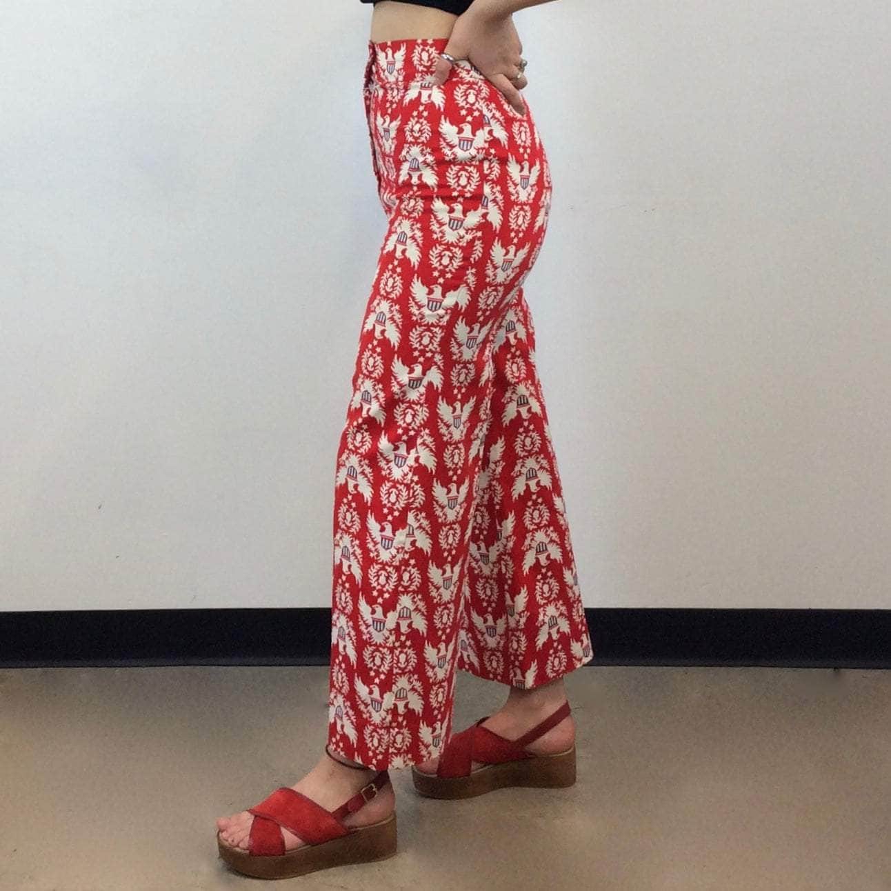 Side view of 1970s Handmade High-Waist Wide Leg eagle print pants size small-medium sold by Boheme Vintage Montreal