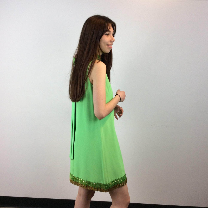 Back and side view of 1960s Lime Green Petite Shift Mini Dress Size Small/Medium sold at bohemevintage.com Montreal