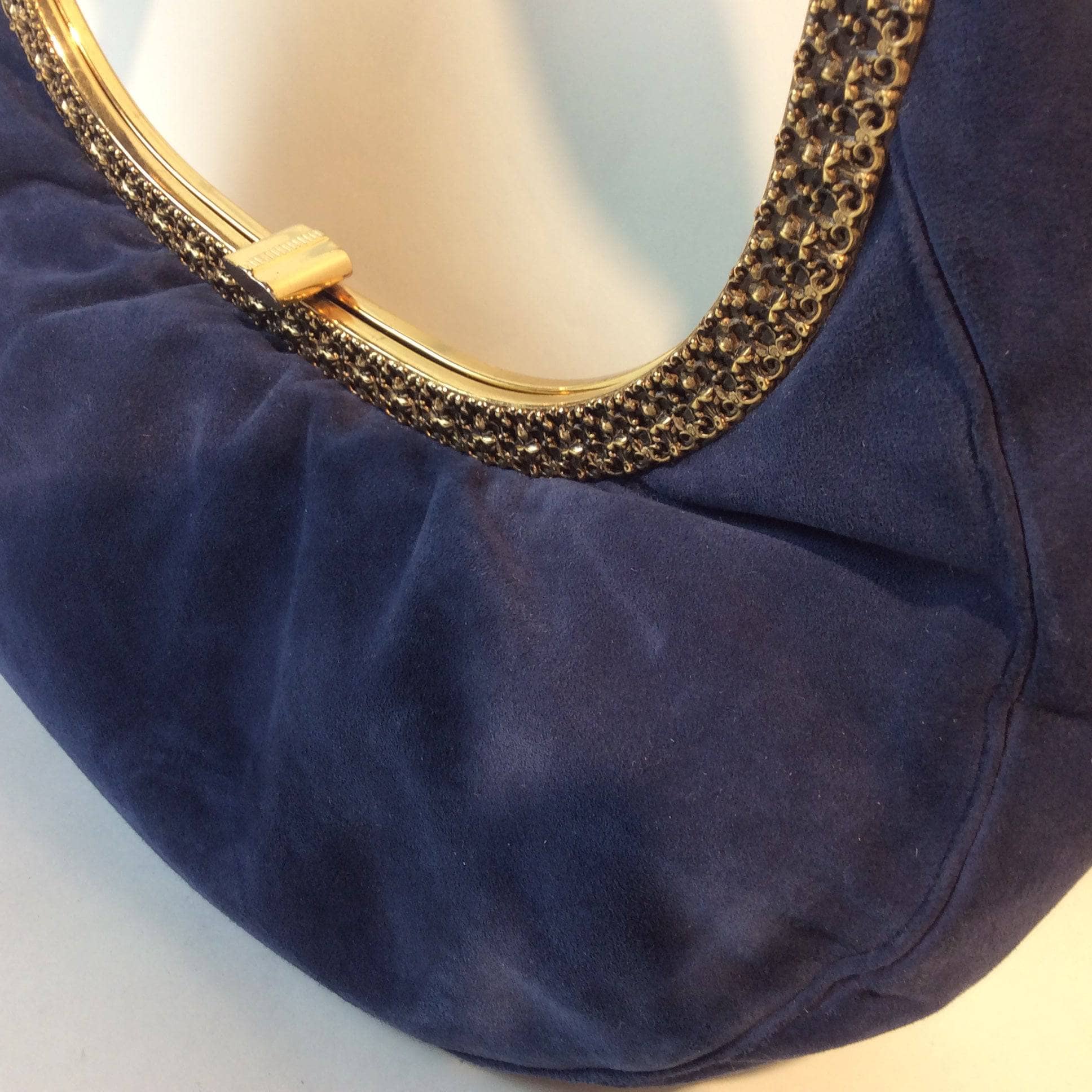 1950’s Blue Suede Crescent Handbag with Detailed Gold Frame Sold by bohemevintage.com Montréal