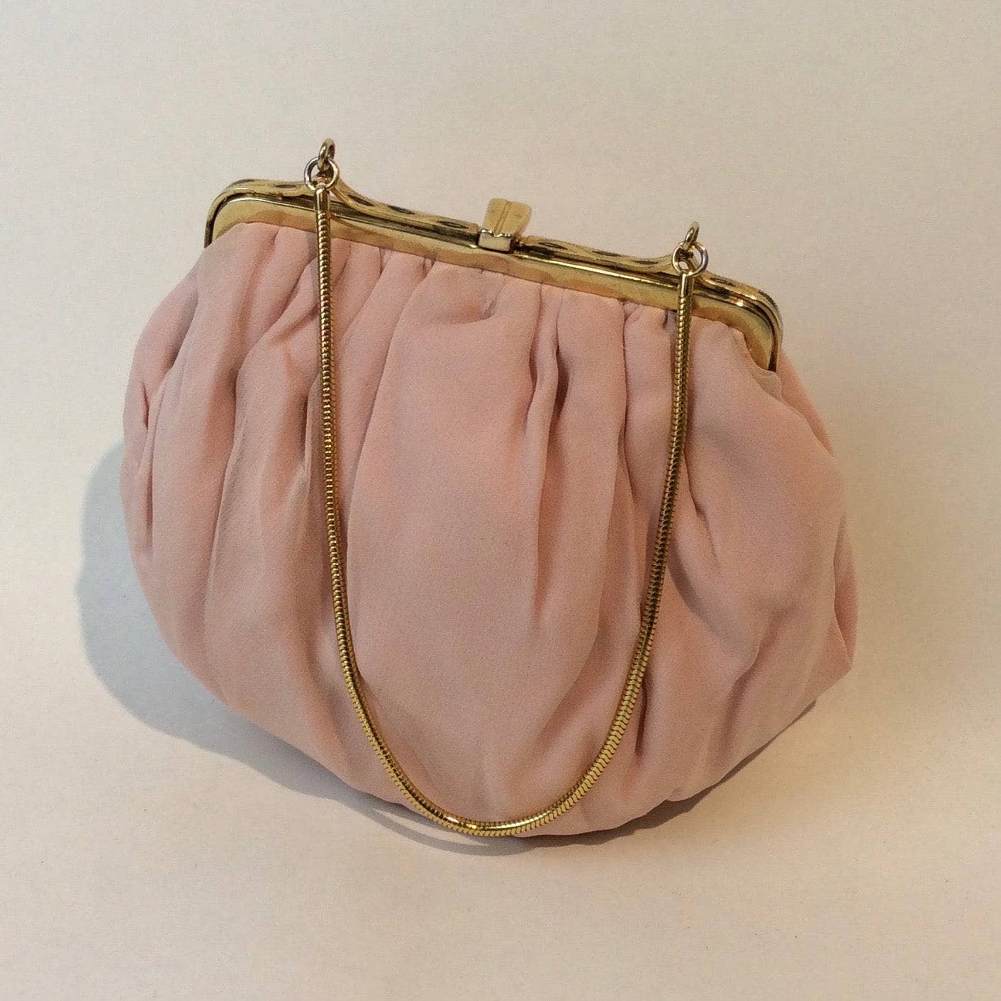 1950s Light Pink Silk Crepe Evening Bag. Sold at bohemevintage.com Montreal